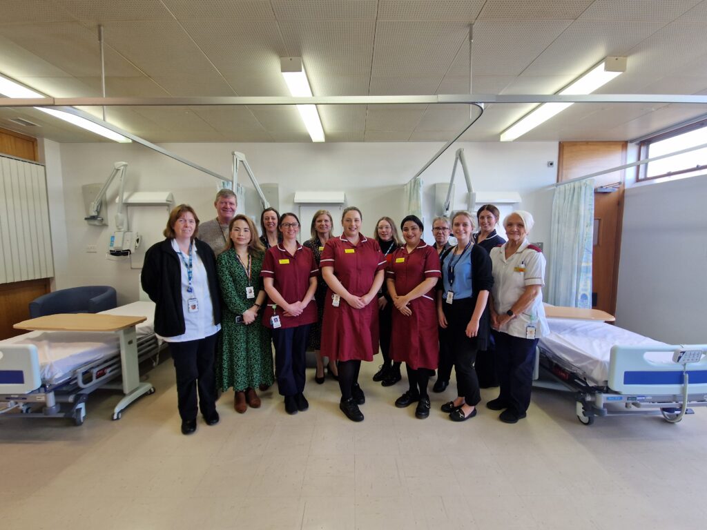 Back row from left: Steve Ellis, Annette Kelly, Dr Osborne, Dr Annie Baldwin, Ann Hewison, Katy Tait, Front row from left: Barbara Armstrong, Mona Khoo, Jane Dixon, Laura Hedley, Meenakshi Kaushik, Dr Vicky Calvert, and Irene Jobson